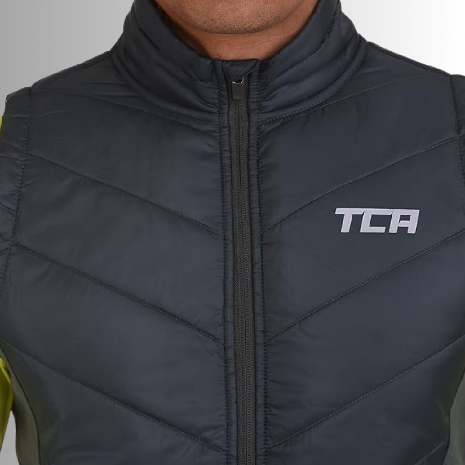 TCA Herren Excel Runner Leichte und gepolsterte Weste mit Reißverschlusstaschen Größe: L