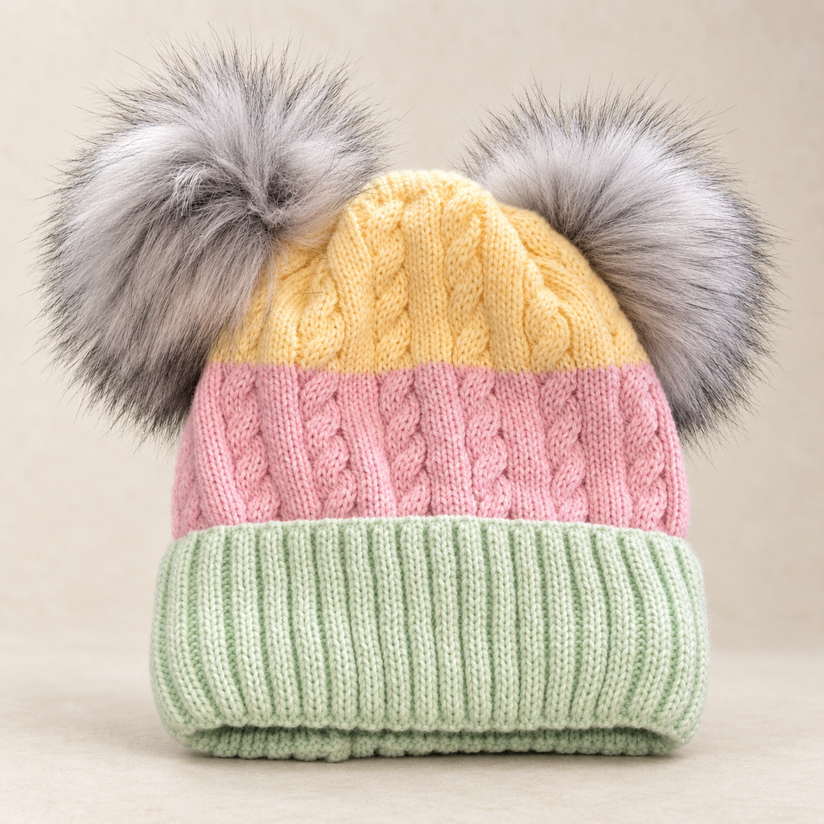 Kinder-Mütze in Strickoptik mit zwei Pompons Pastellfarben
